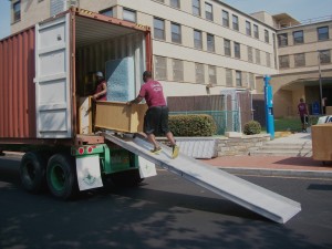Dormitory furniture from Howard University (Washington DC) is loaded for shipment to a community in El Salvador.